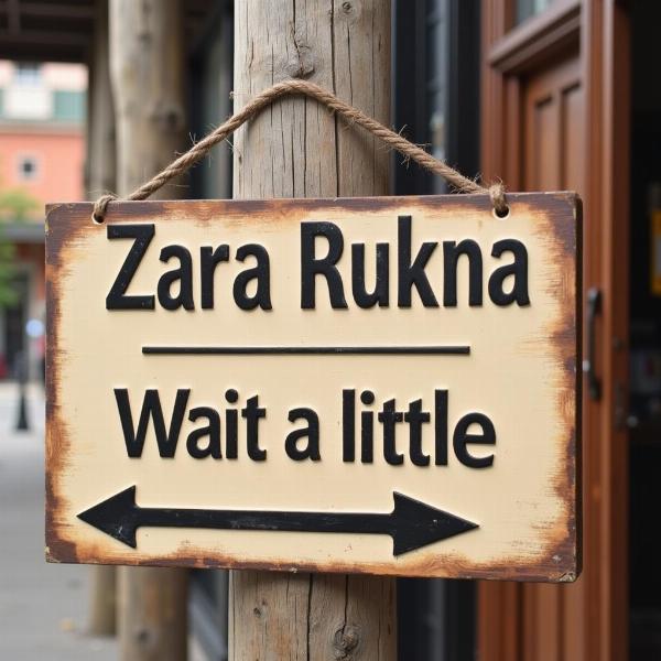 A Sign Saying "Zara Rukna"